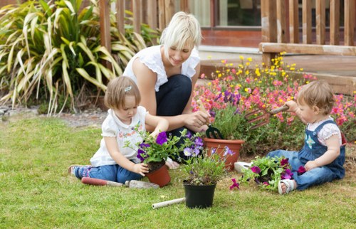 Professional landscaper working in a Kensington backyard
